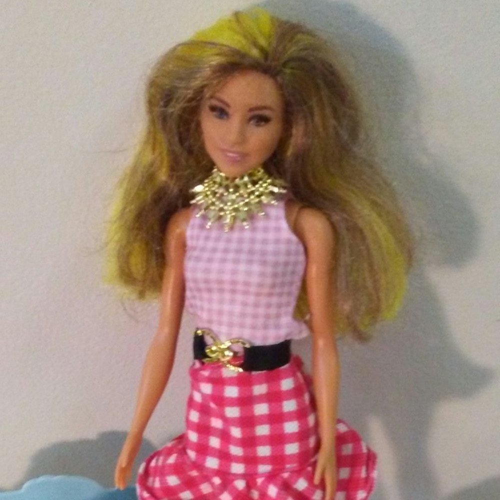 Barbie with brown/blond hair with mermaid accessories